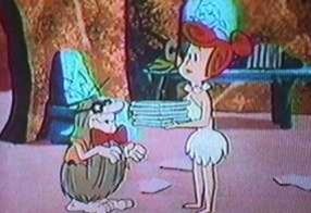 Captain Caveman's clever disguise fools Wilma